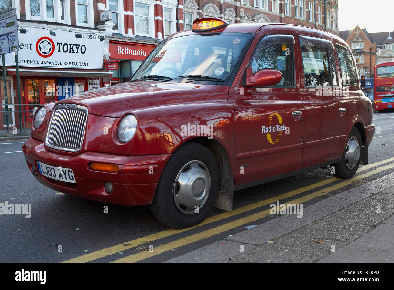 Europe, Great Britain, England, London, red taxi cab with light on Stock Photo