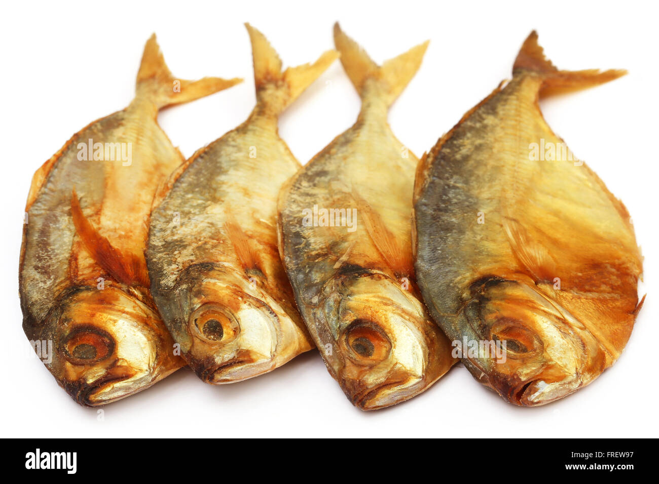 Dry scaled sardine fish over white background Stock Photo