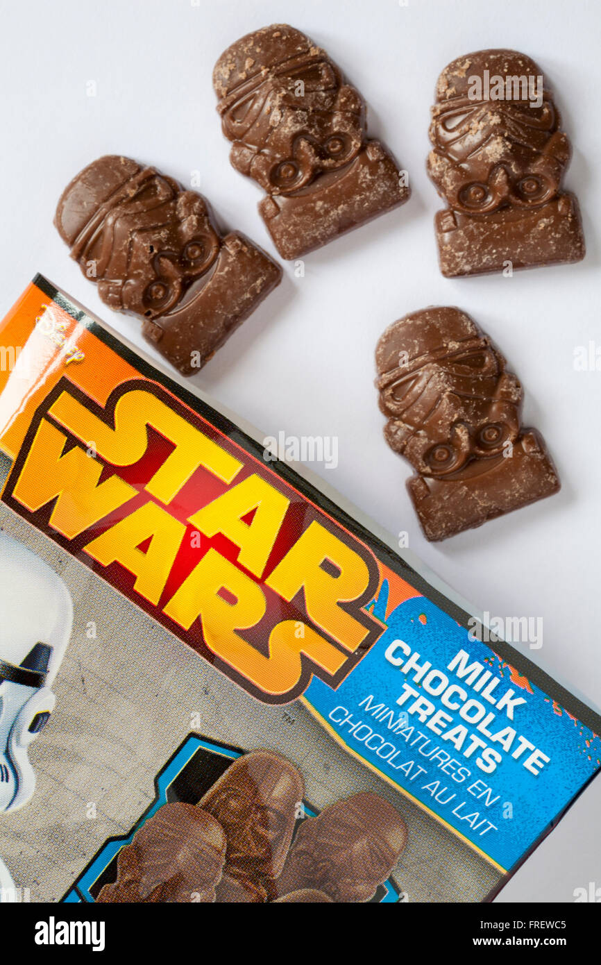 Packet of Star Wars milk chocolate treats from Star Wars 9 piece selection box chocolates from Kinnerton open to show contents set on white background Stock Photo