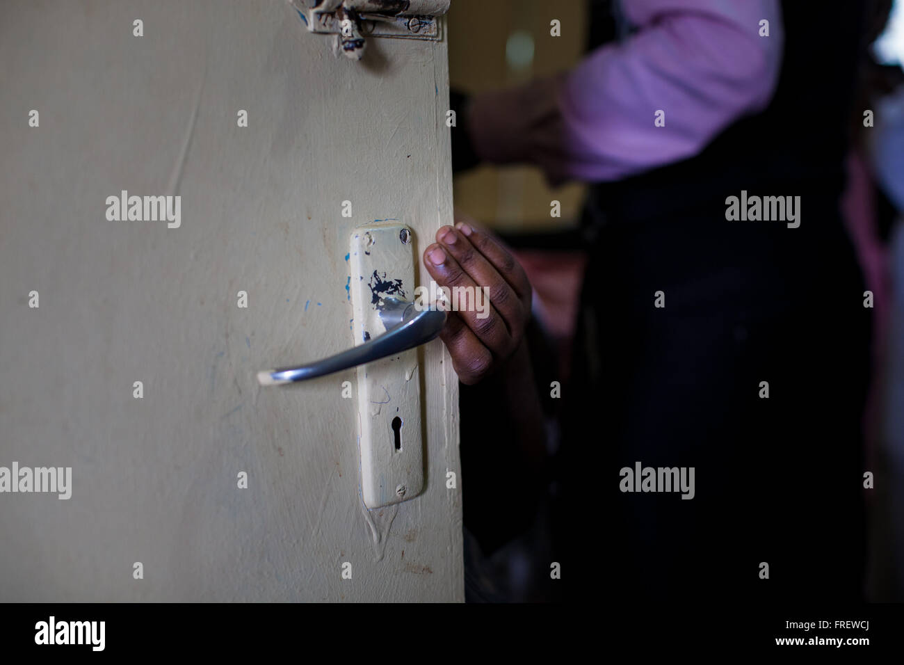 Hand holding door handle hires stock photography and images Alamy