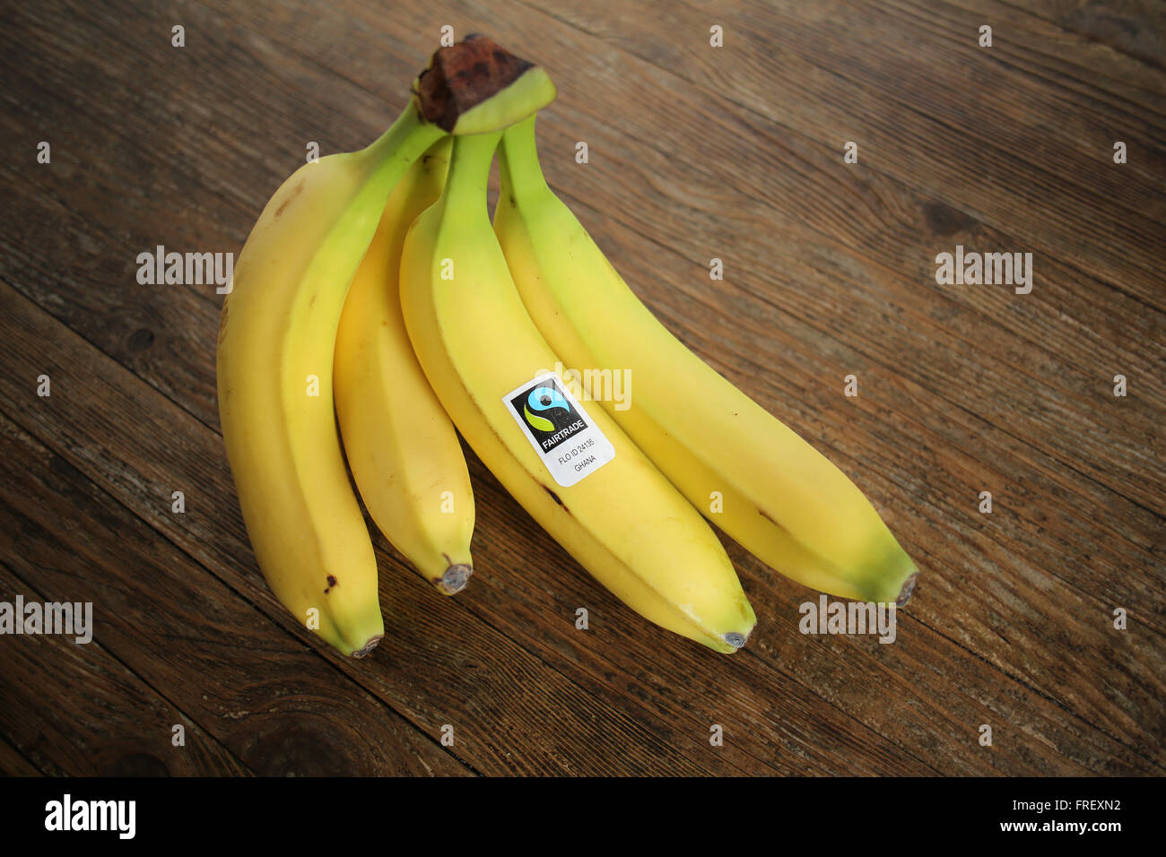 A bunch of Fair Trade Bananas from Ghana, West Africa Stock Photo