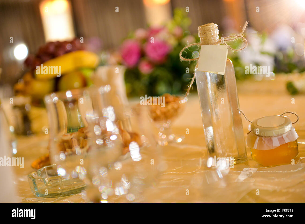 Alcohol bottle placed on a wedding table Stock Photo Alamy