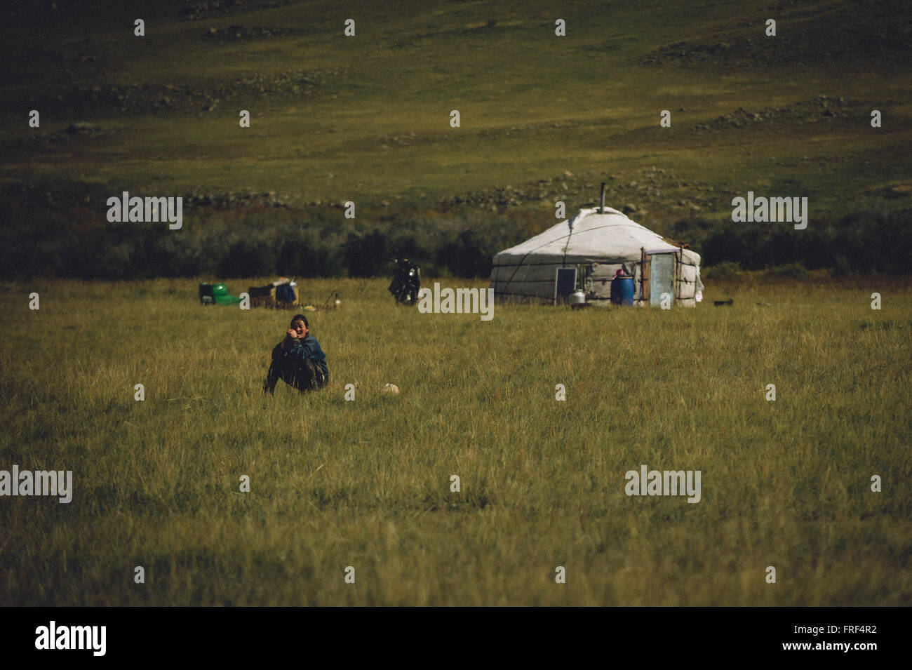 Mongolian Nomad Woman In Front Of Her Yurt High Resolution Stock ...