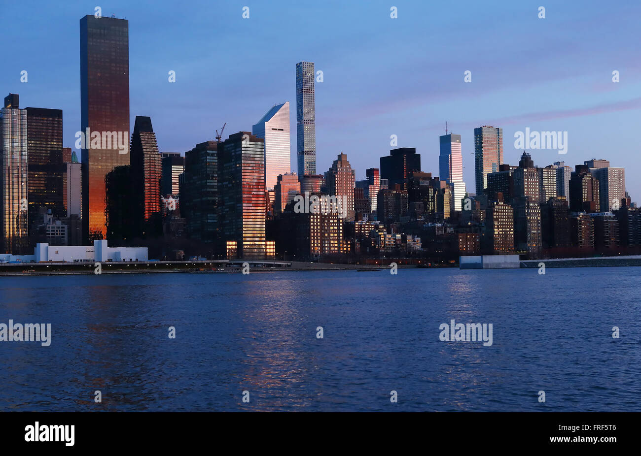 Midtown Manhattan as seen from Gantry State Park at sunrise in New York City, New York, United States of America. Stock Photo