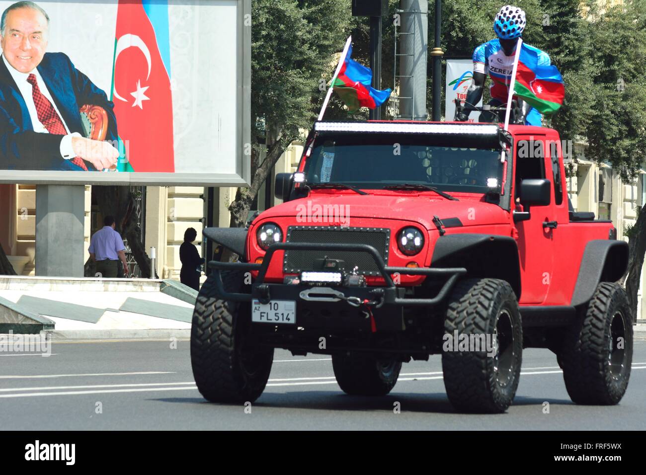 BAKU, AZERBAIJAN - MAY 11 2014  Tour d'Azerbaijan lead car with photo of Heydar Aliyev Stock Photo