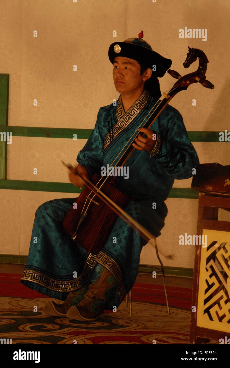 Mongolia -  09/08/2010  -  Mongolia / Ulan Bator / Ulan Bator  -  Horse fiddle player   -  Sandrine Huet / Le Pictorium Stock Photo