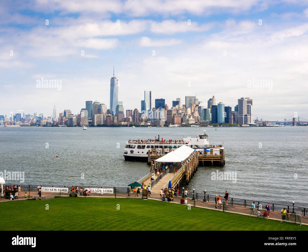 View back towards Lower Manhattan from Liberty Island, New York, USA. Stock Photo