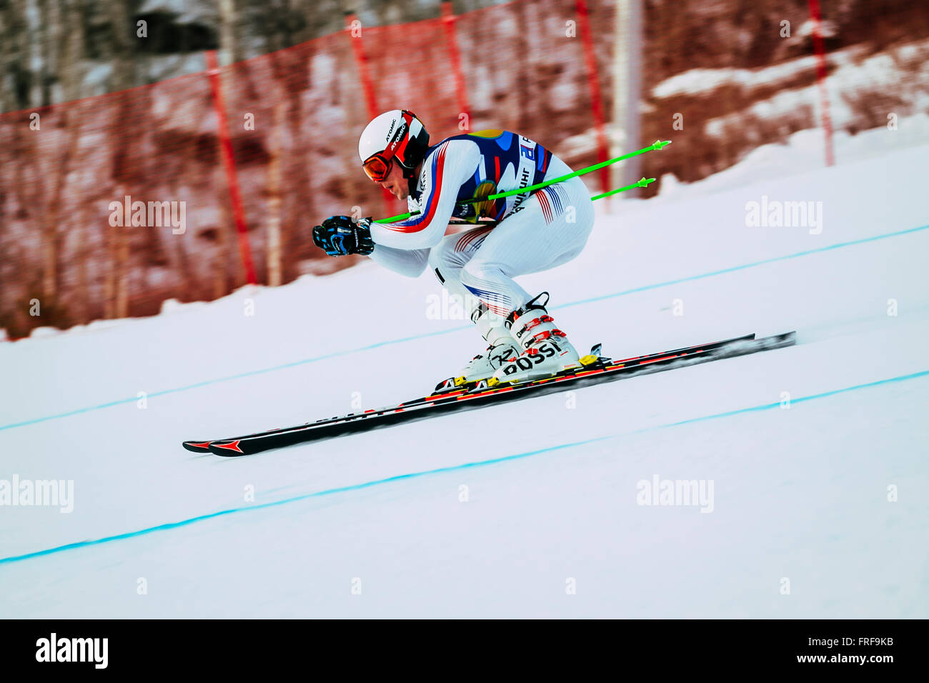 downhill racer young men in competition Russian Cup in alpine skiing