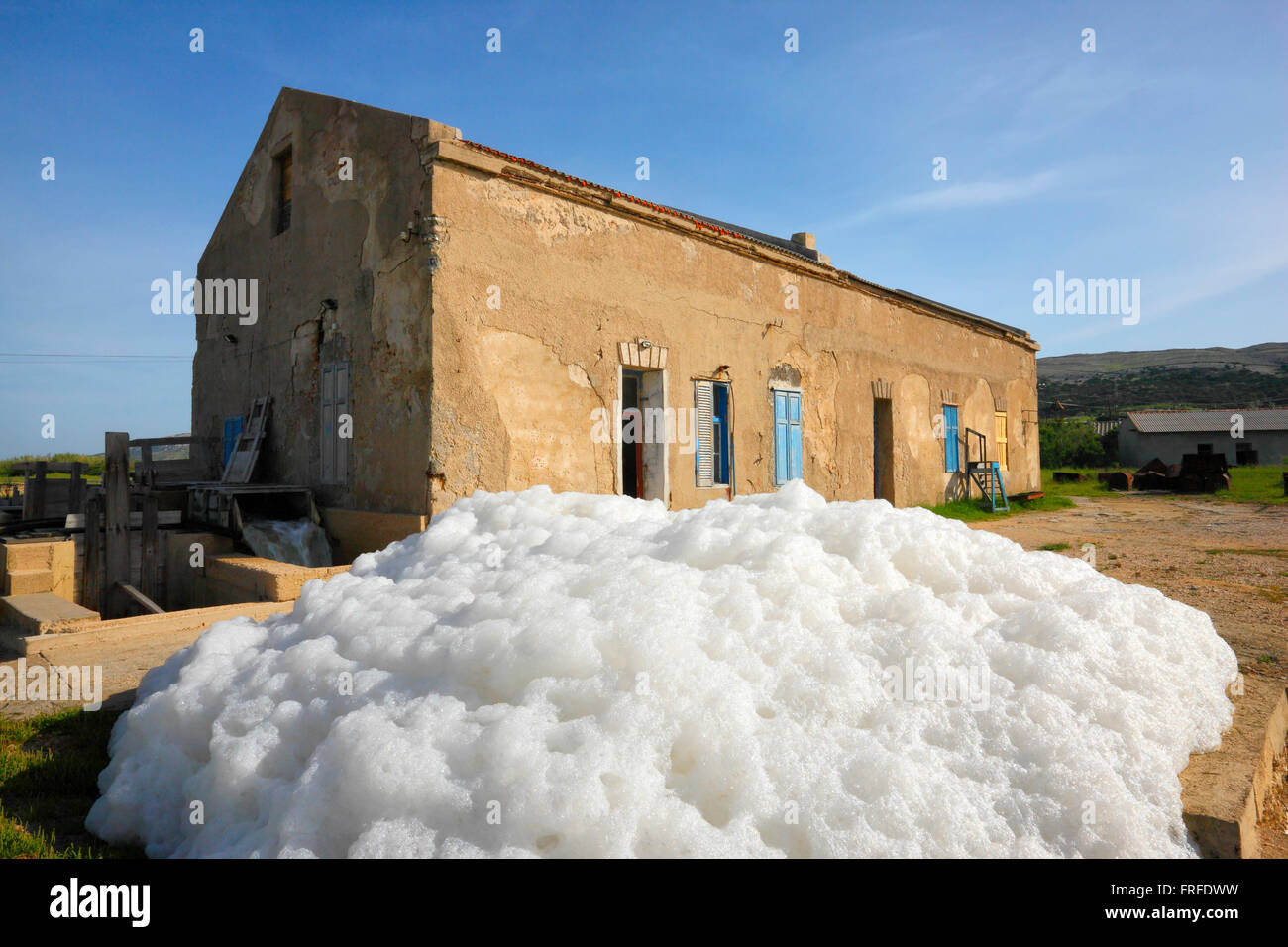 Pag, Croatia - Old salt work, salt-water foam in process of salt making Stock Photo