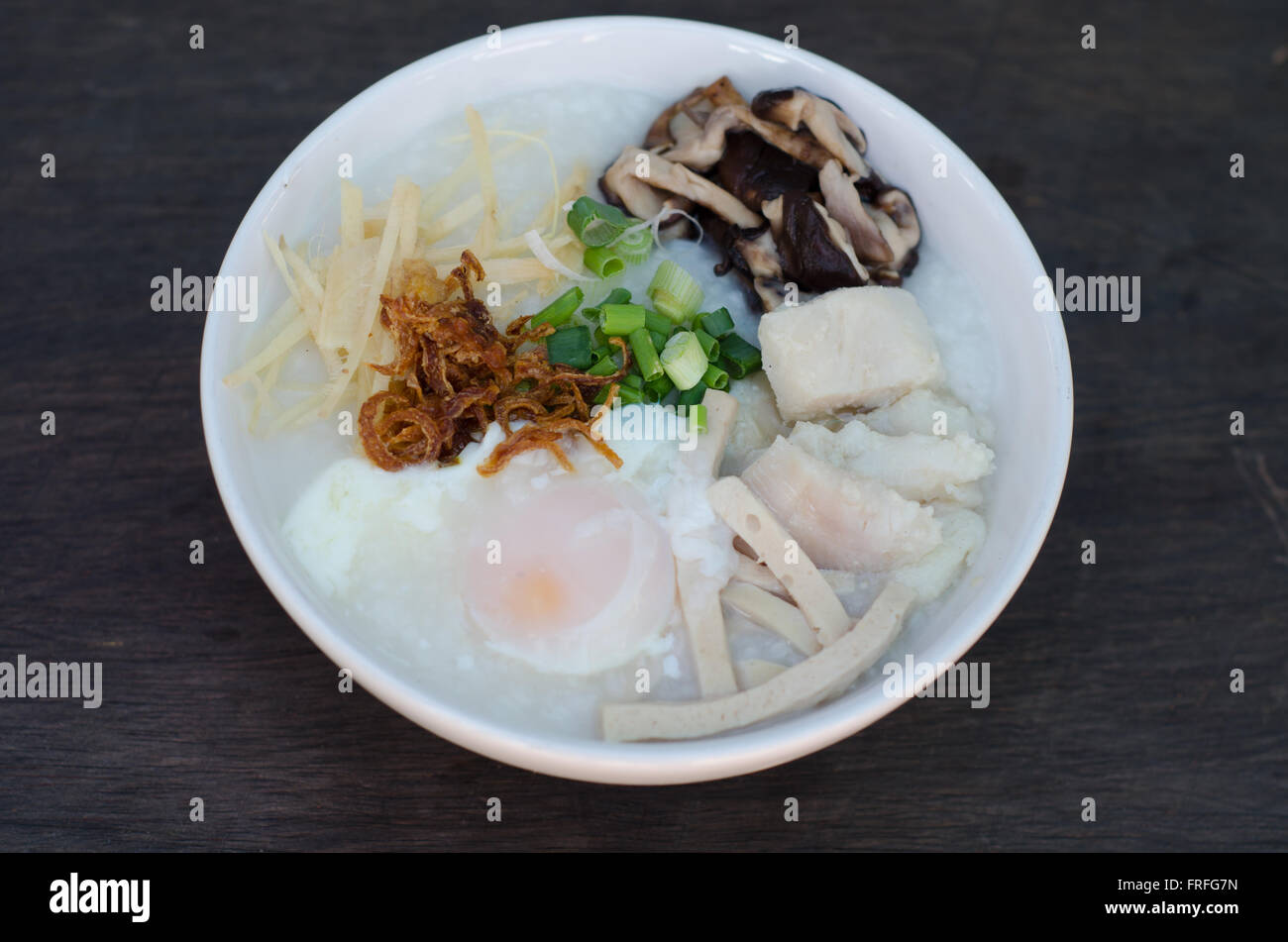 rice gruel with fish and egg mixed Stock Photo