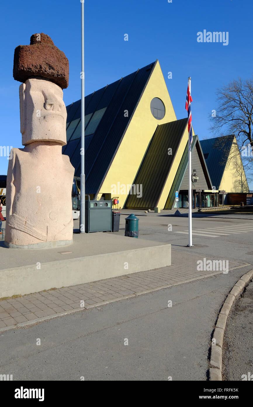 The Polar Museum housing the ship 'Fram' in Oslo, Norway with a statue at the Kon Tiki museum in the foreground Stock Photo