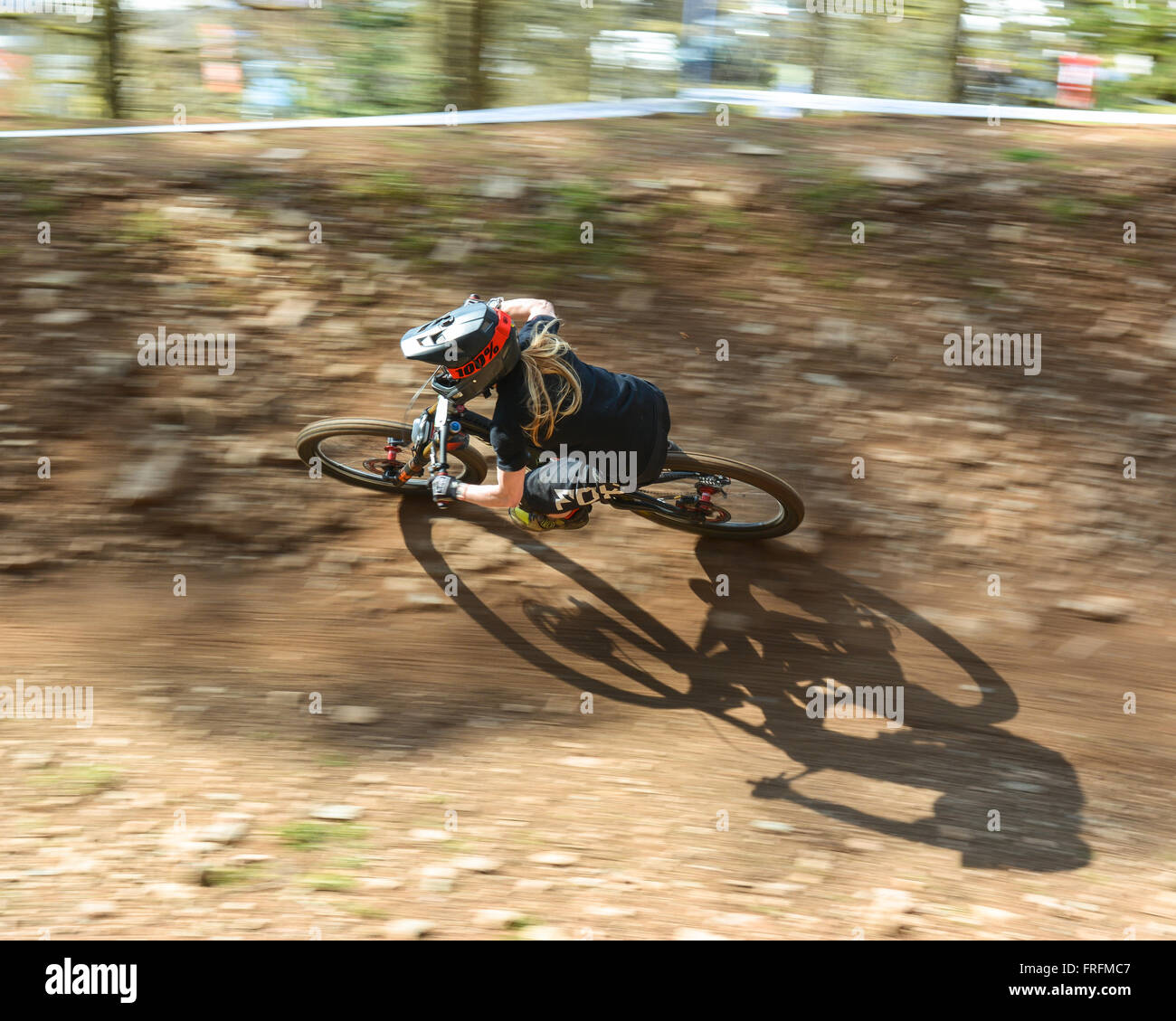 female downhill mountain biker Becci Skelton competing in SDA race at Ae Forest, Dumfries, Scotland - Becci won the senior women Stock Photo