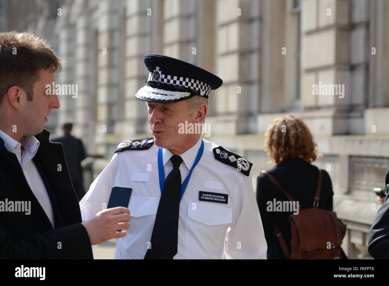 London, UK. 22nd March, 2016. Met Police commissioner, Sir Bernard Hogan-Howe, arrives at the COBRA meeting  and talks to journalists in Whitehall following the terror attacks in Belgium. Credit: Marc Ward/Alamy Live News Stock Photo
