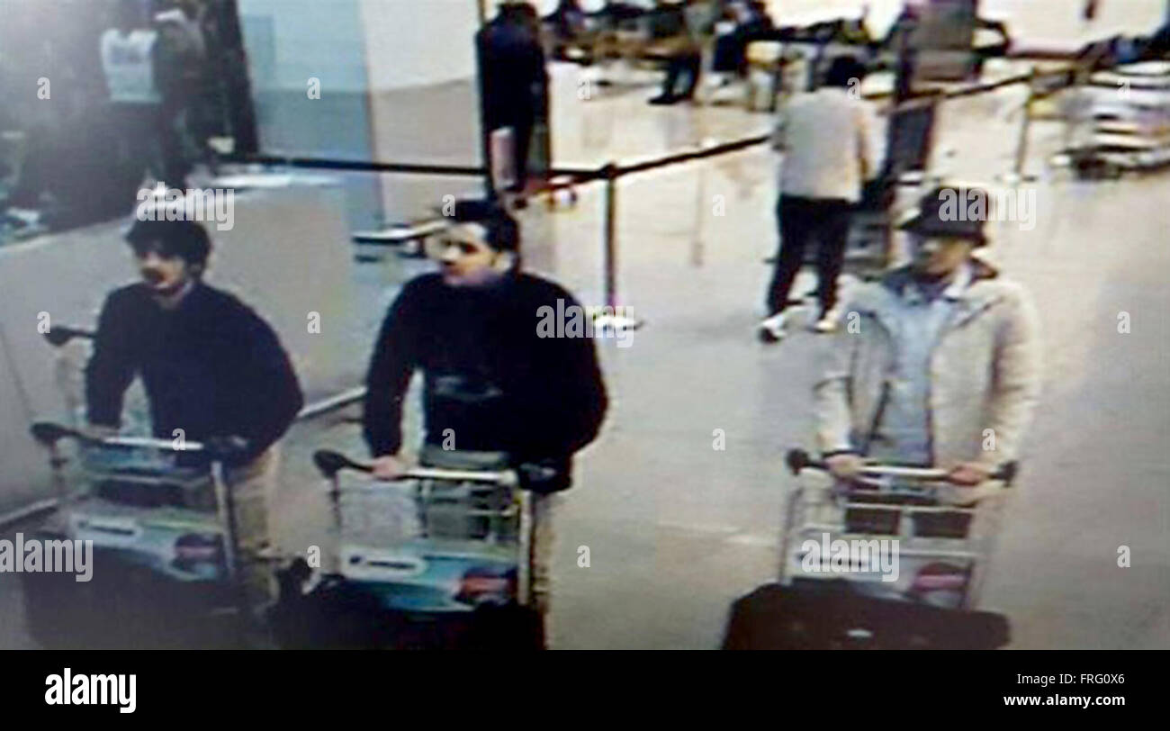 Brussels Airport, Belgium. 22nd Mar, 2016. A picture released on March 22, 2016 by the belgian federal police on demand of the Federal prosecutor shows a screengrab of the airport CCTV camera showing three suspects of this morning's attacks at Brussels Airport, in Zaventem PICTURE VIA BELGIAN FEDERAL POLICE Stock Photo