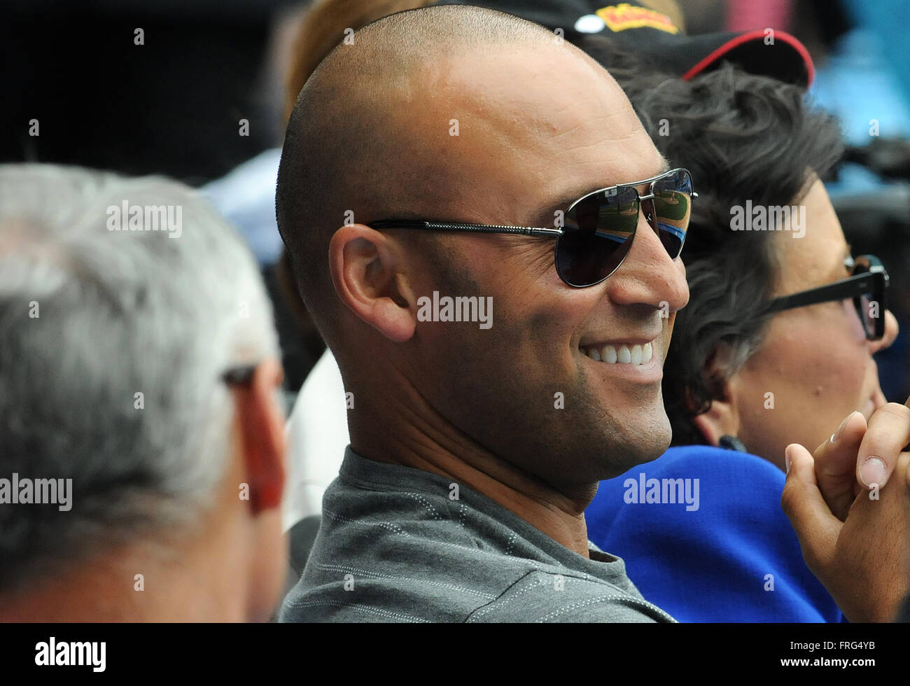 Havana, Cuba. 22nd March, 2016. Retired New York Yankees player Derek Jeter enjoys the exhibition baseball game between the Cuban National team and the Tampa Bay Rays at Estadio Latinamericano in Havana, Cuba on March 22, 2016. Tampa Bay beat the Cuban team 4-1. U.S. President Barack Obama and Cuban President Raul Castro attended the game. Credit:  Paul Hennessy/Alamy Live News Stock Photo