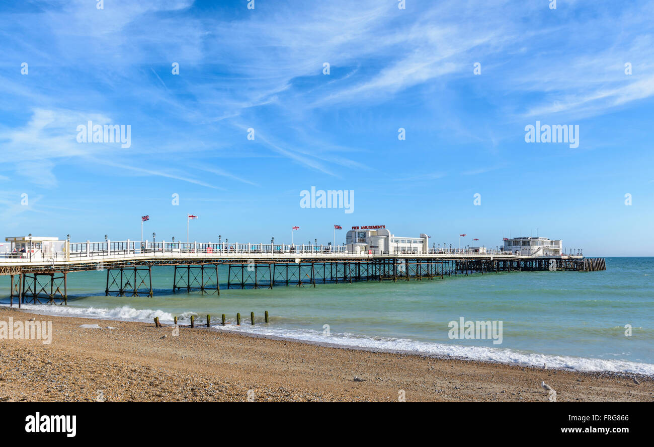 Worthing Pier on a sunny day with blue sky in Worthing, West Sussex, England, UK. Stock Photo
