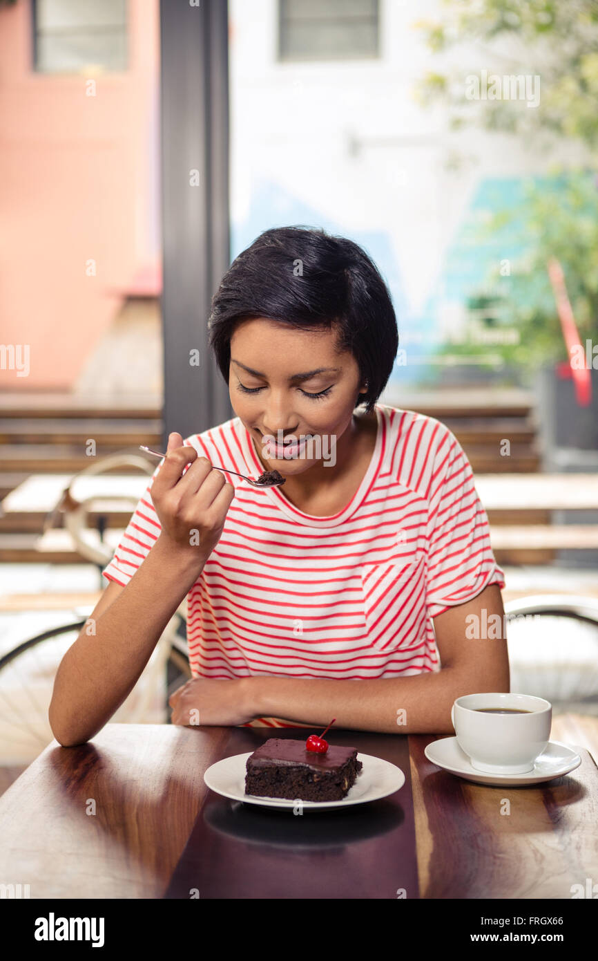 Woman eating chocolate cake hires stock photography and images Alamy