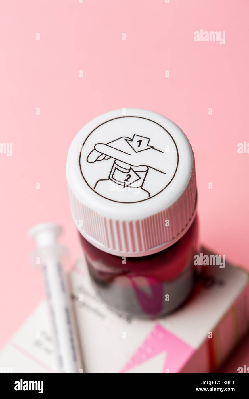 Medicine bottle with a white safety cap. Stock Photo