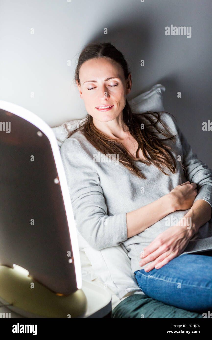 Light therapy, or phototherapy treatment of depression with light