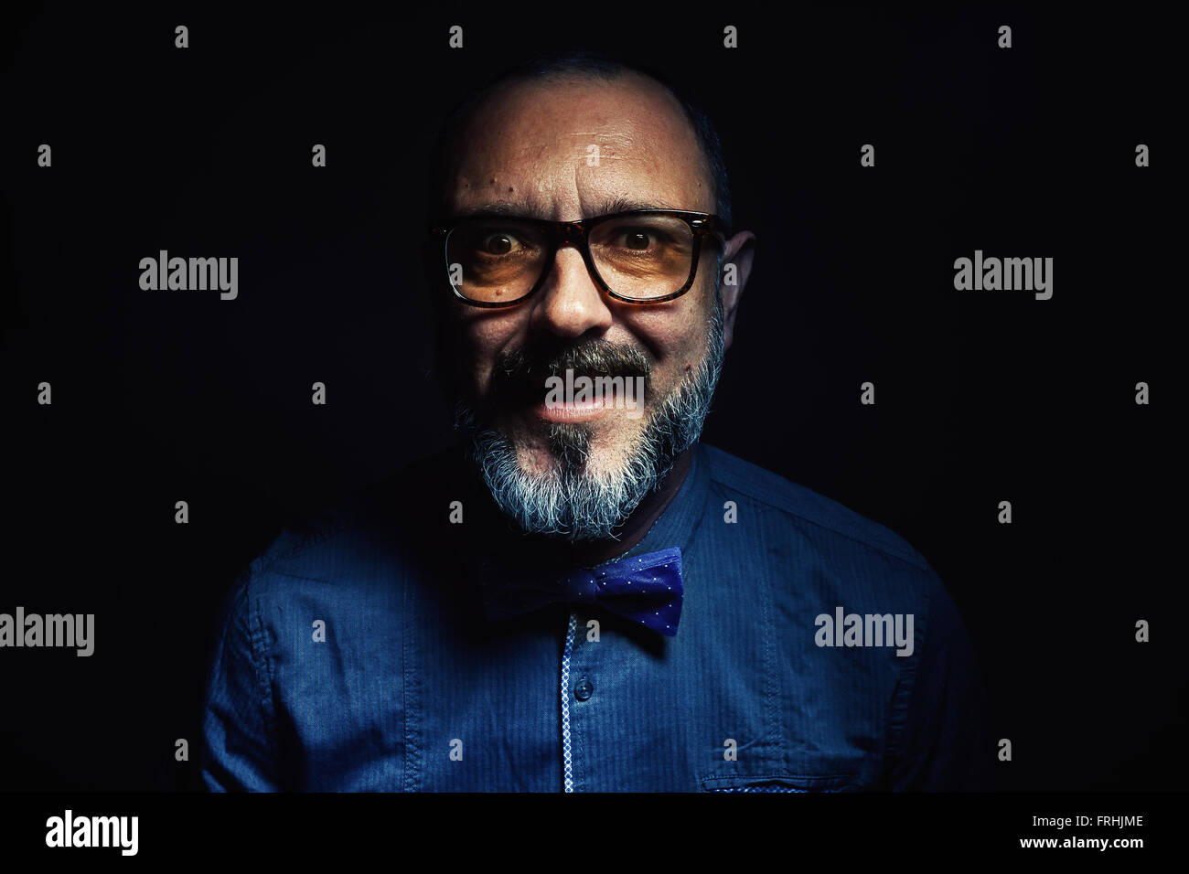 Portrait of a middle aged beard man, facial expression details. Stock Photo