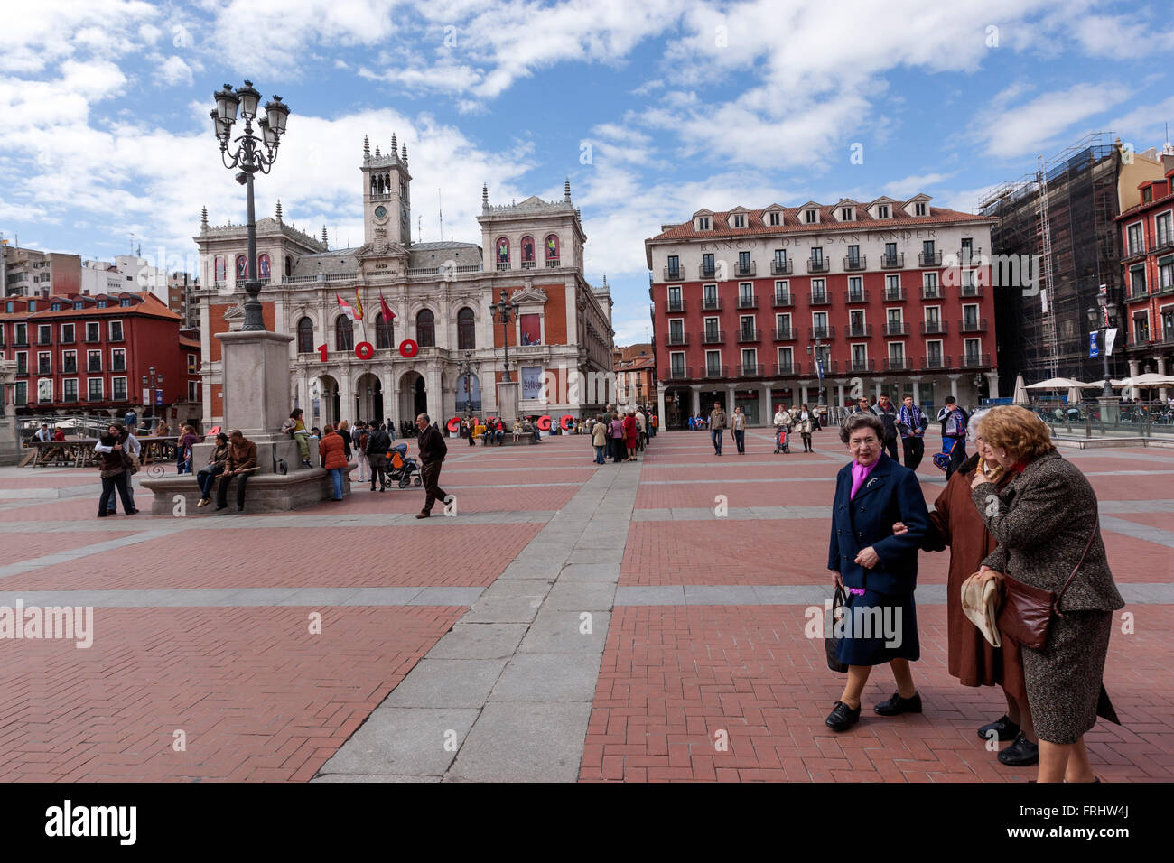 Group of old ladies walking in the Plaza Mayor with the City Hall, Valladolid, Castile and León, Spain Stock Photo