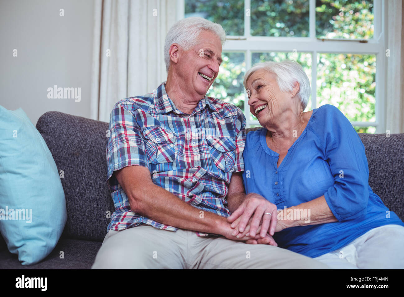 Senior couple holding hands hi-res stock photography and images - Alamy