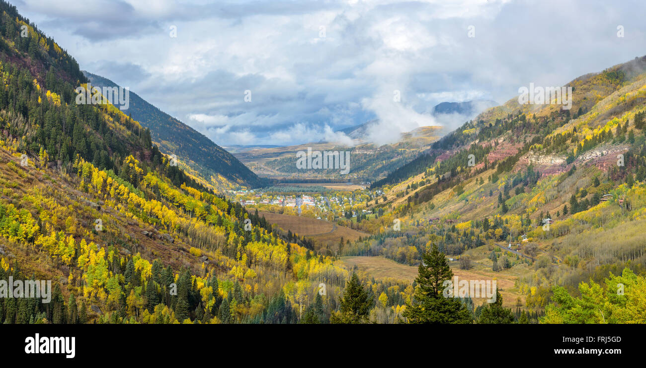 Autumn at Telluride - Panoramic view of a misty autumn morning at the town of Telluride, looking west from Black Bear Pass Road. Stock Photo