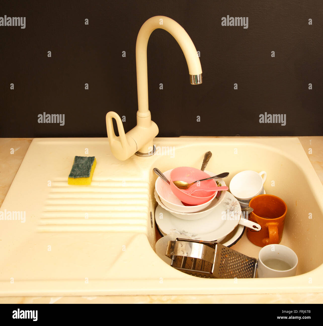 Dirty dishes in kitchen sink in closeup Stock Photo Alamy
