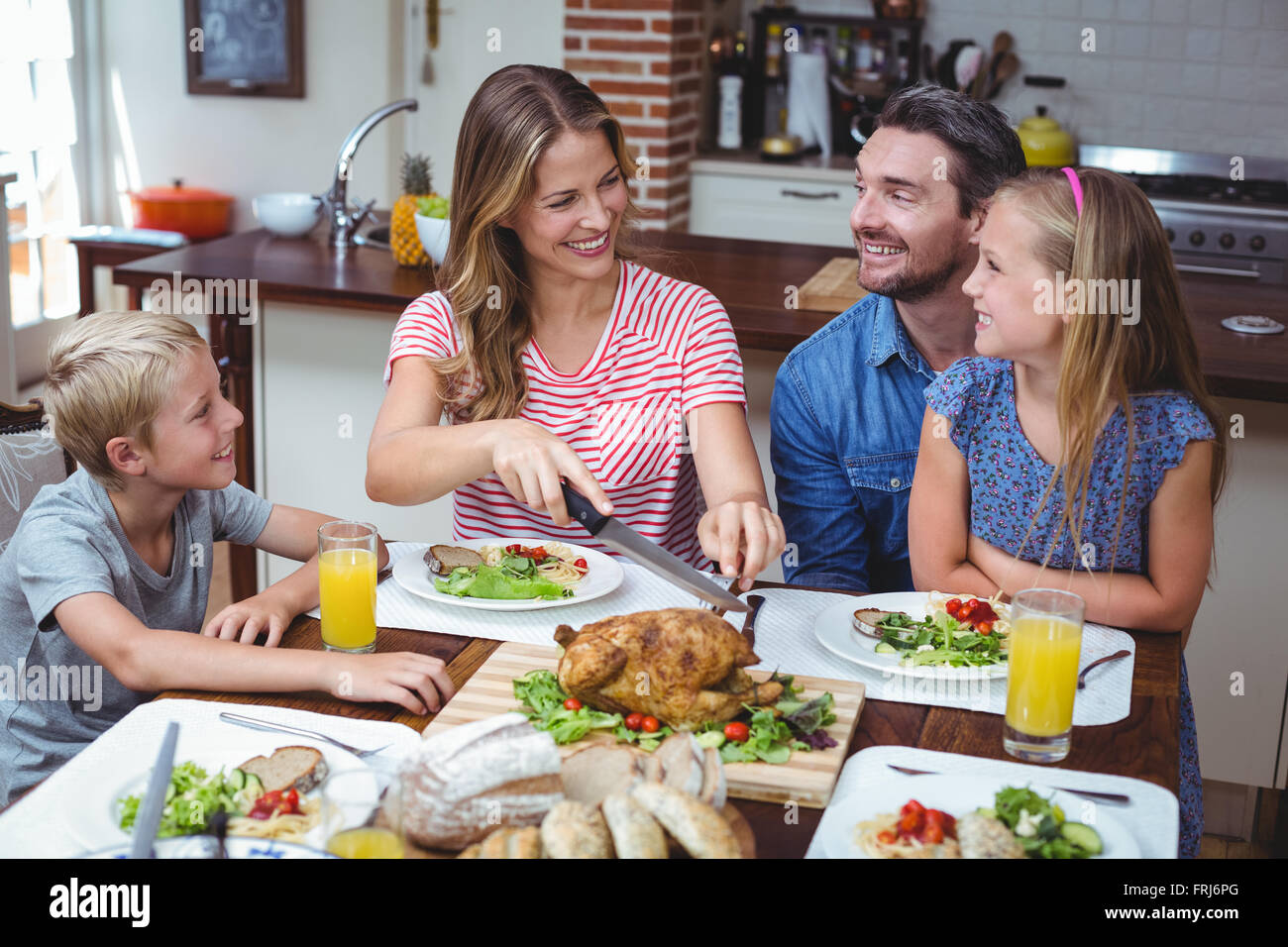 Smiling family celebrating thanksgiving Stock Photo