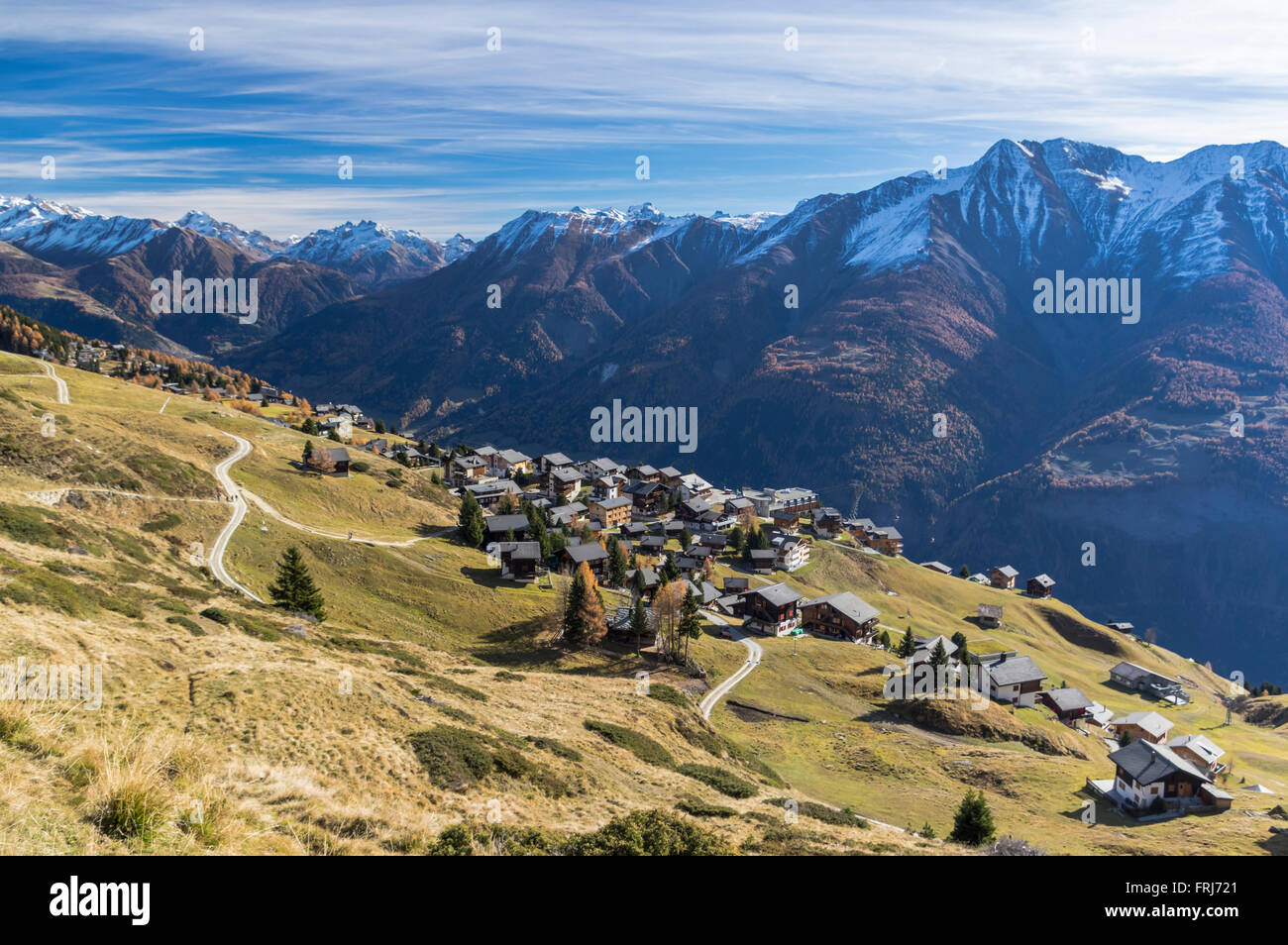 View of the village of Riederalp and surrounding mountains in the Alps. Valais/Wallis, Switzerland. Sunny autumn day. Stock Photo
