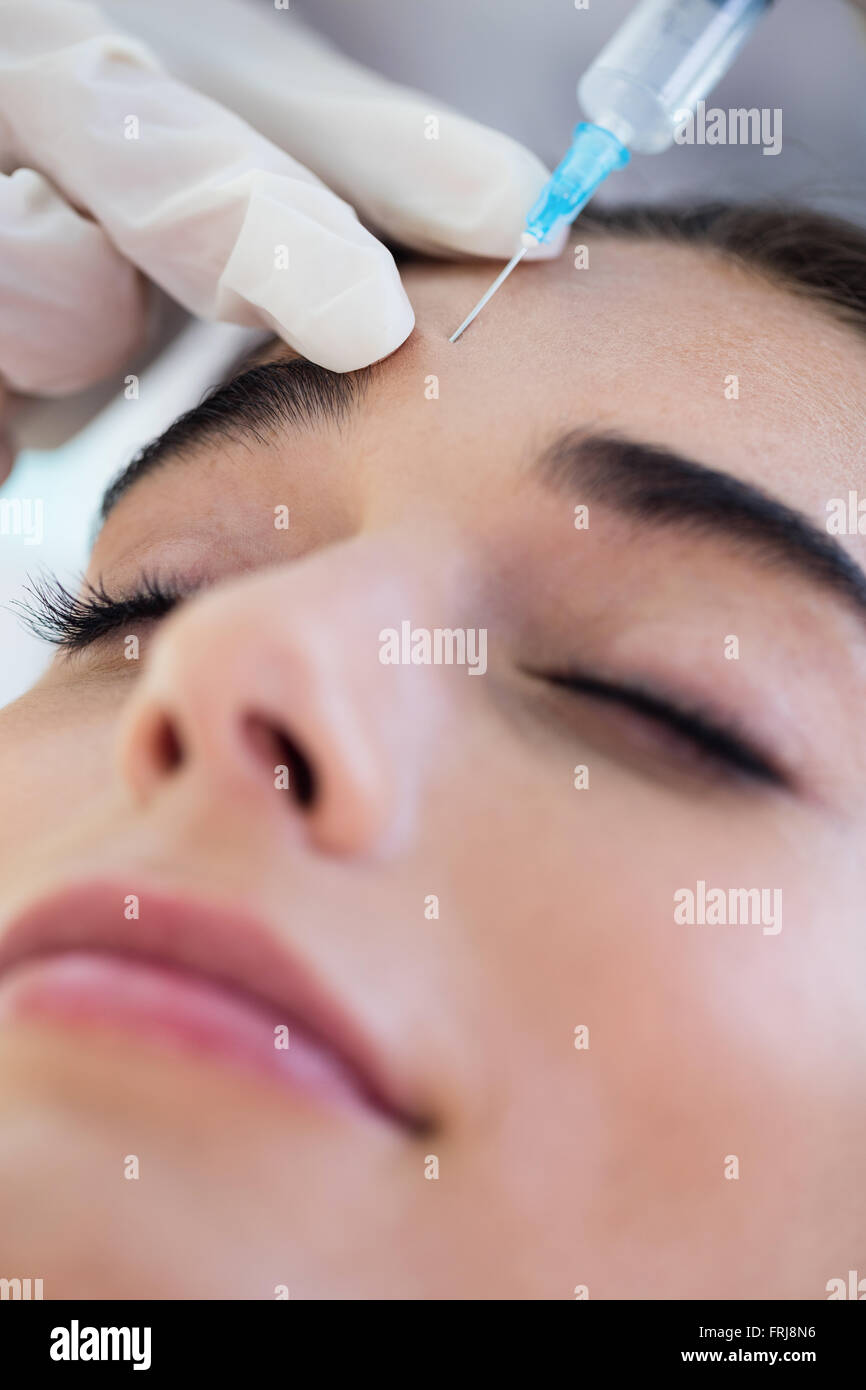 Woman receiving botox injection Stock Photo - Alamy