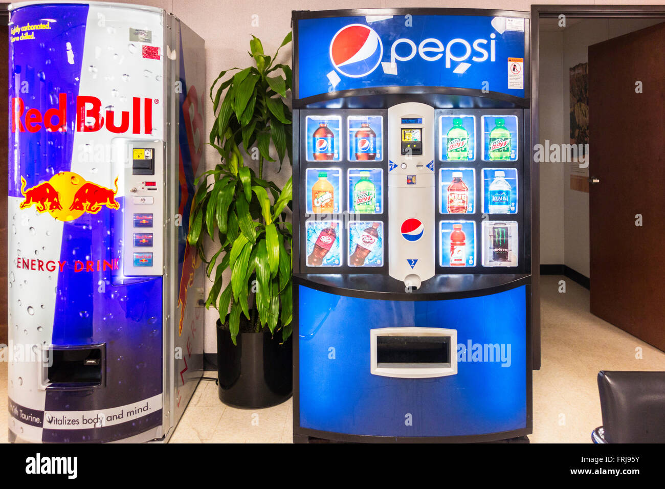 Red Bull and Pepsi machines offering cold energy drinks and soft drinks in Oklahoma, USA. Stock Photo