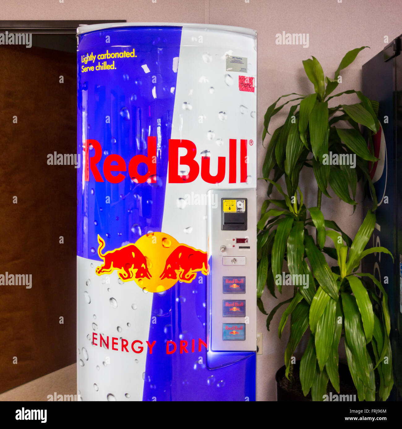 A Red Bull machine offering cold energy drinks in Oklahoma, USA. Stock Photo