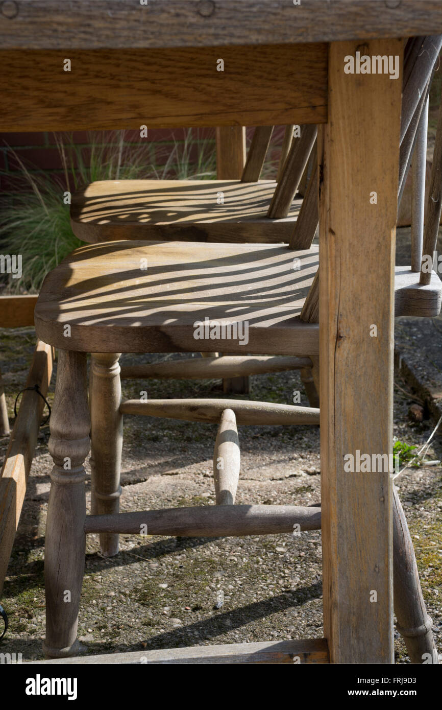 Old wooden table and chairs Stock Photo