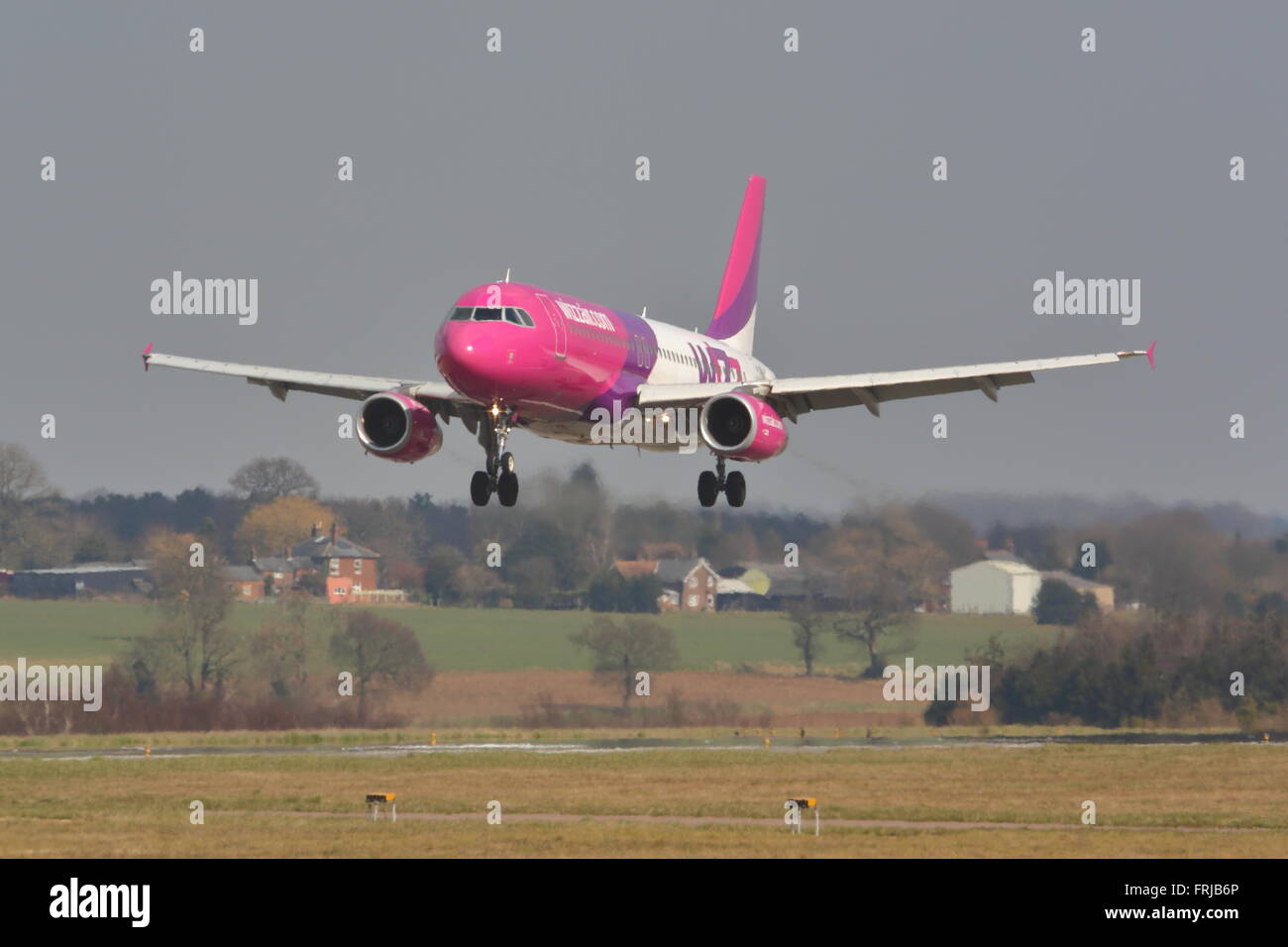 Low-cost airline Wizzair Airbus A320-200 HA-LYK landing at London Luton ...