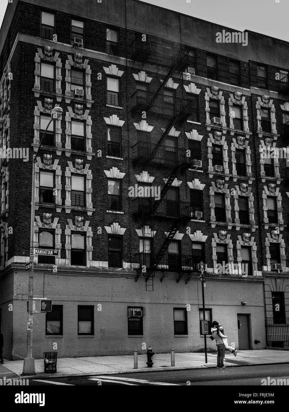 Young couple embracing in street, New York City, USA. Stock Photo