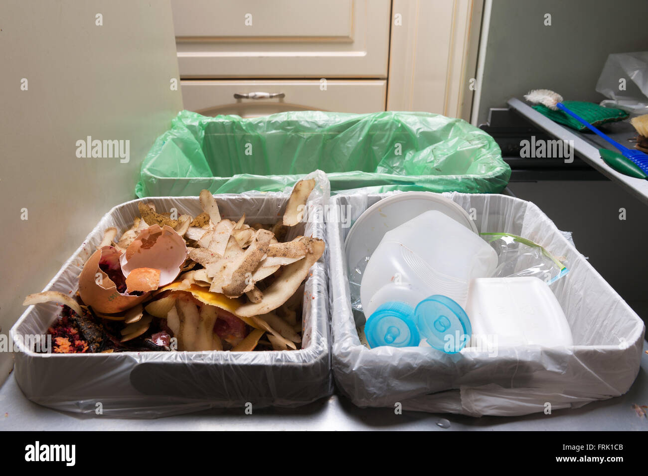 Household waste sorting and recycling kitchen bins in the drawer. Environmentally responsible behavior concept, ecology concept. Stock Photo