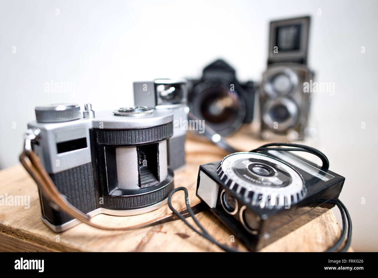 old analogue photographic cameras on the white background Stock Photo