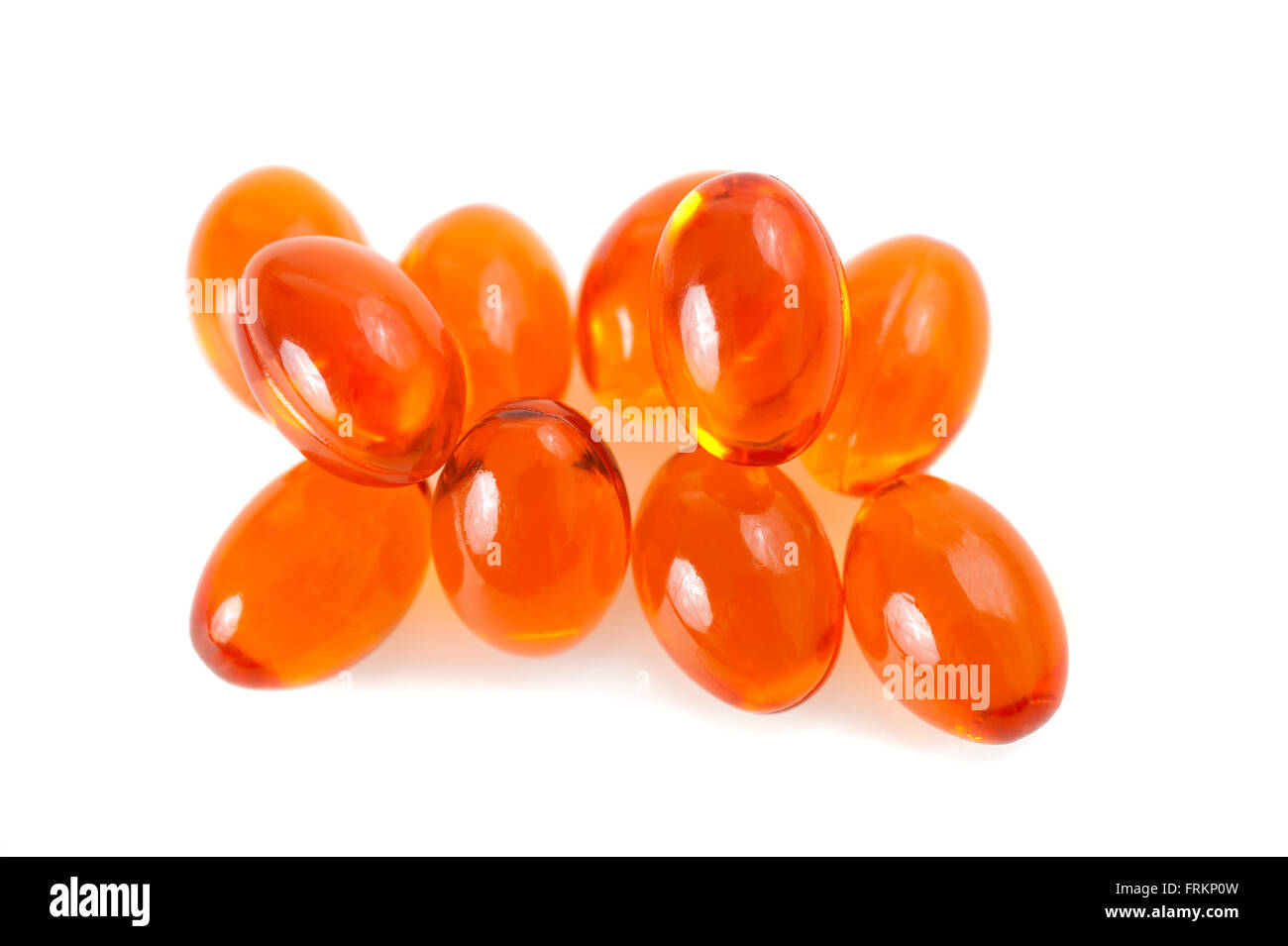 Orange Pills group isolated on white Stock Photo