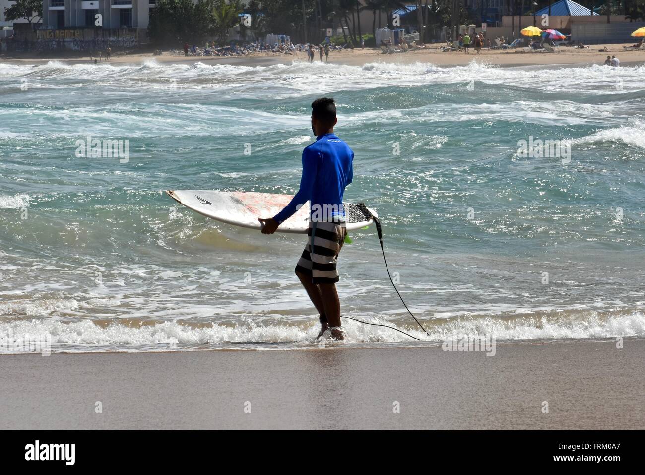 Surfer riding waves at Condado beach in Puerto Rico Stock Photo Alamy