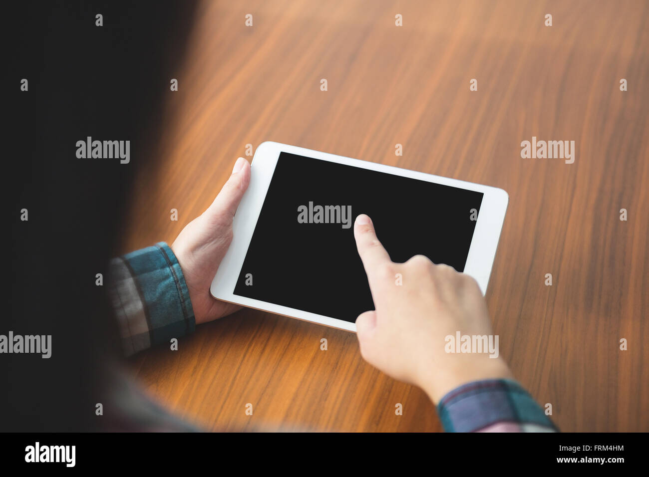 Photo Using Tablet Hand touching tablet computer surface hi-res stock photography and ...