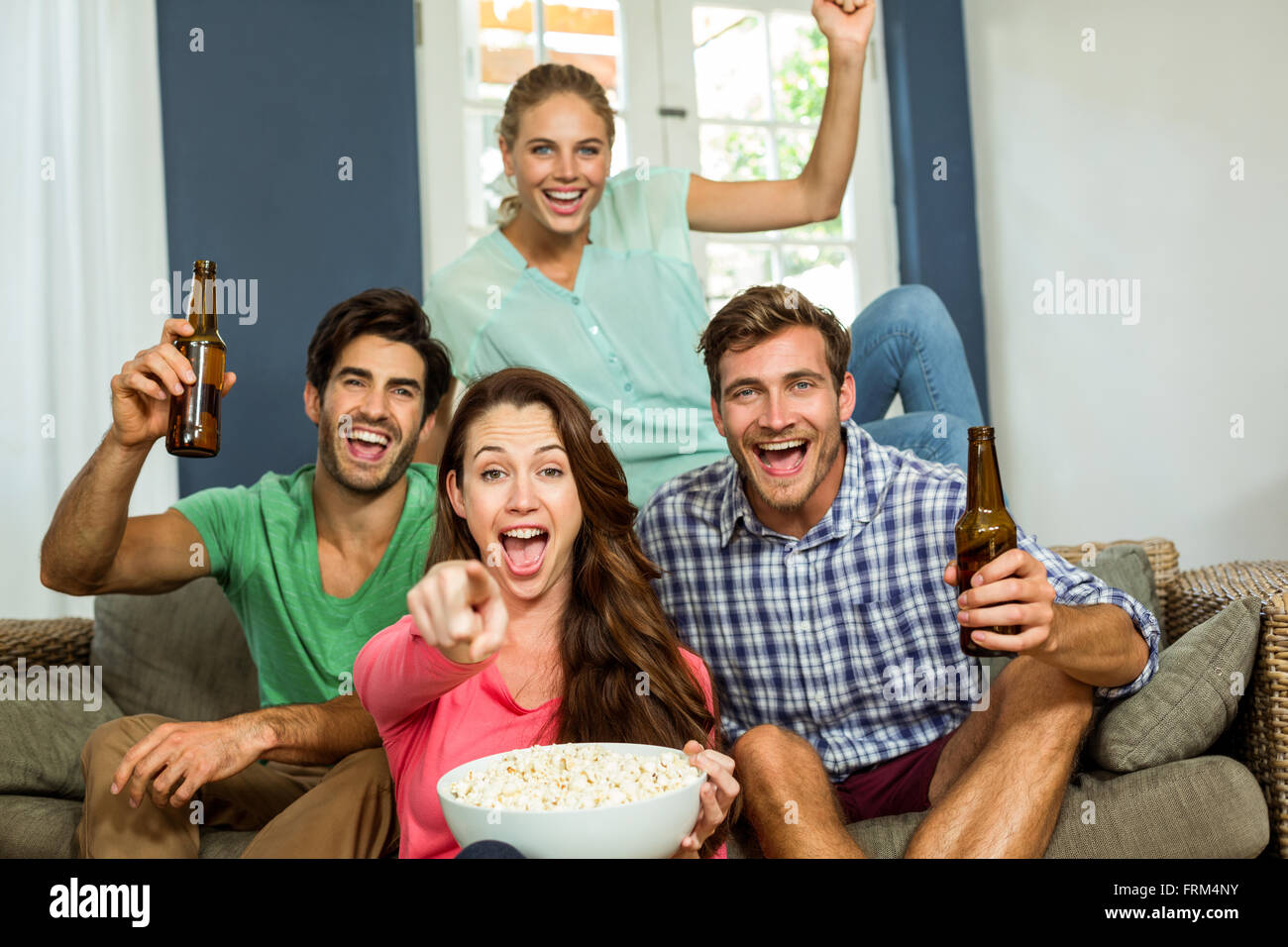 Portrait of smiling friends enjoying party Stock Photo - Alamy