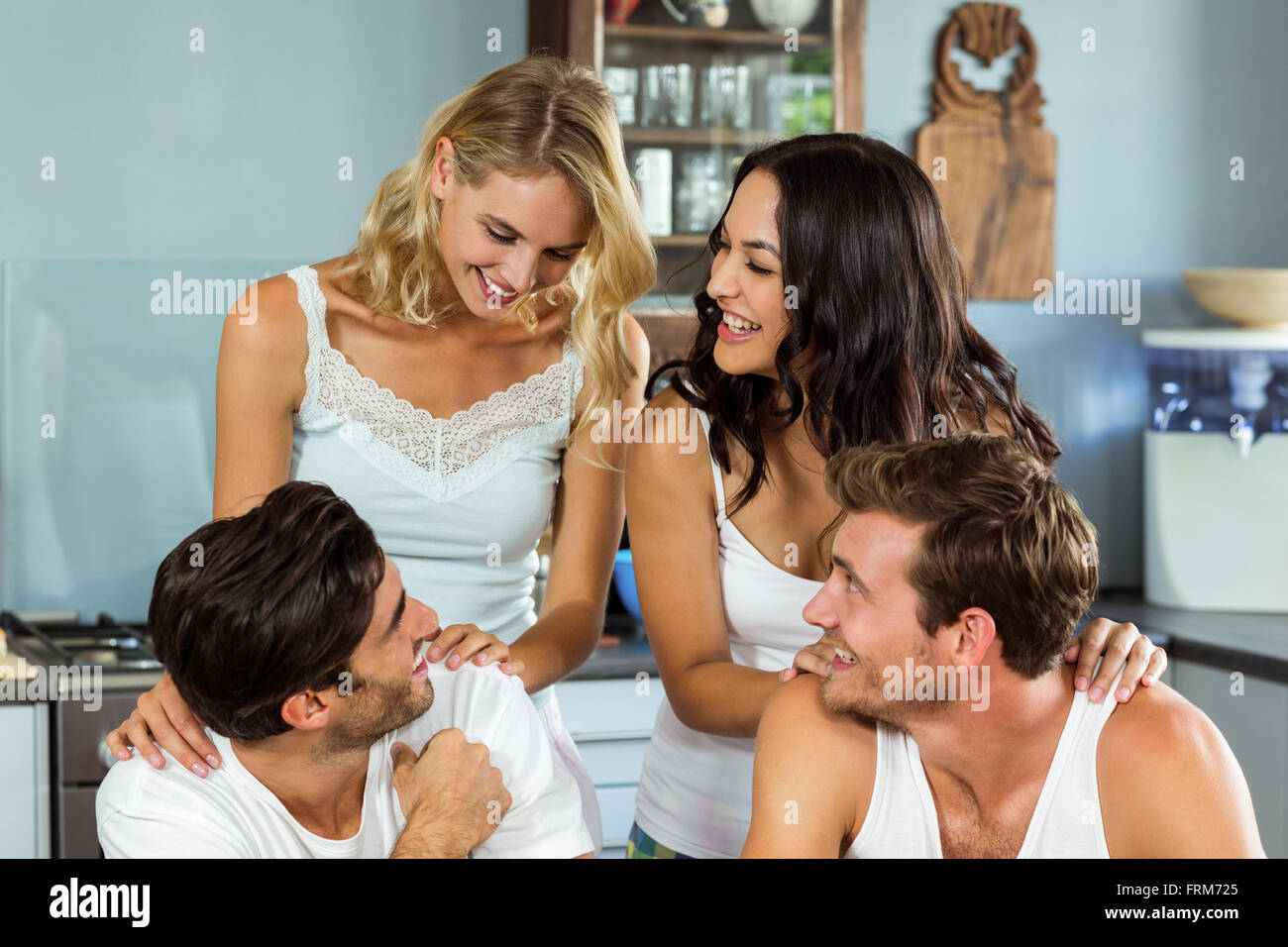 Young couples spending leisure time at home Stock Photo