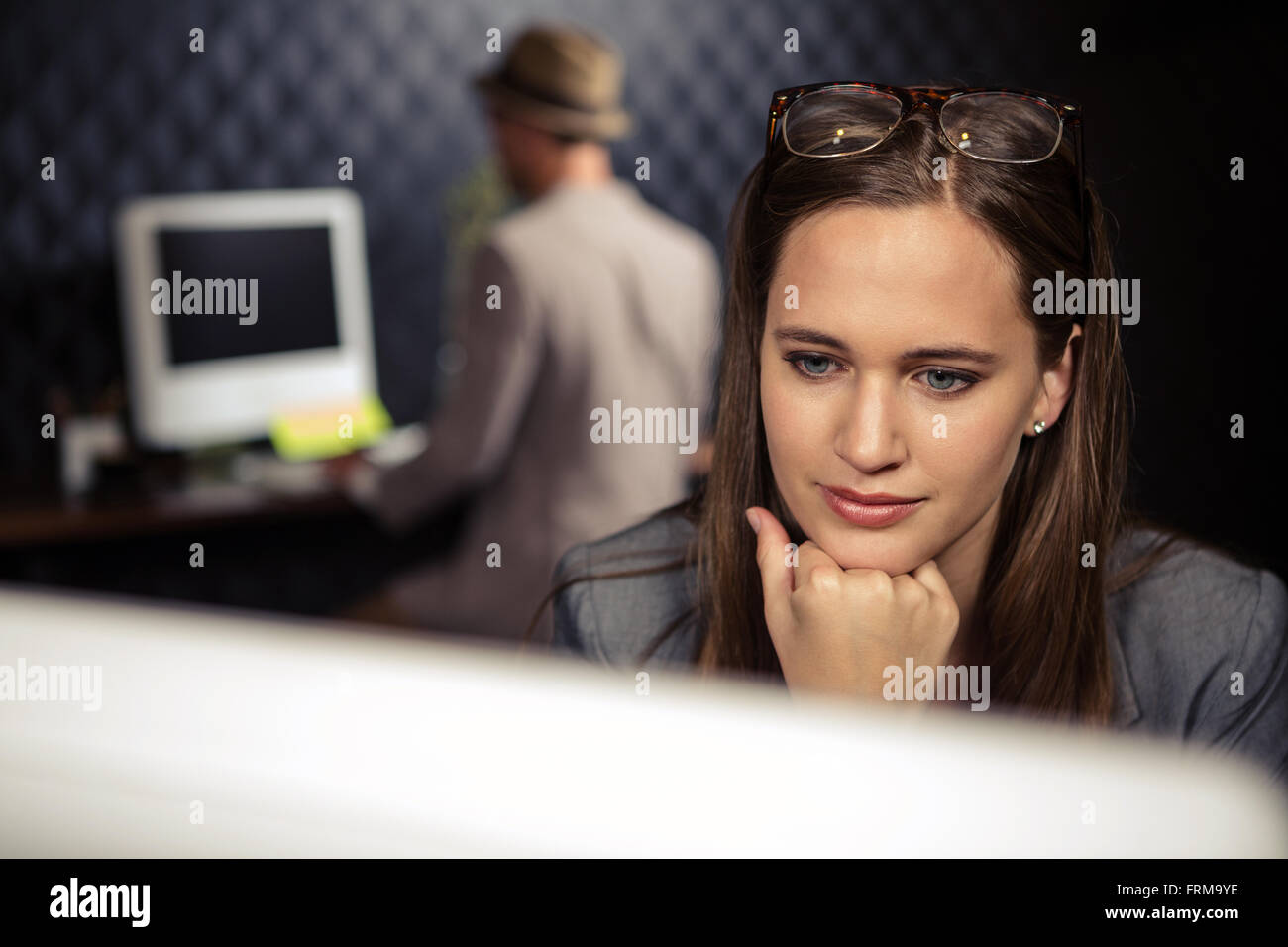 Creative businesswoman using computer Stock Photo - Alamy