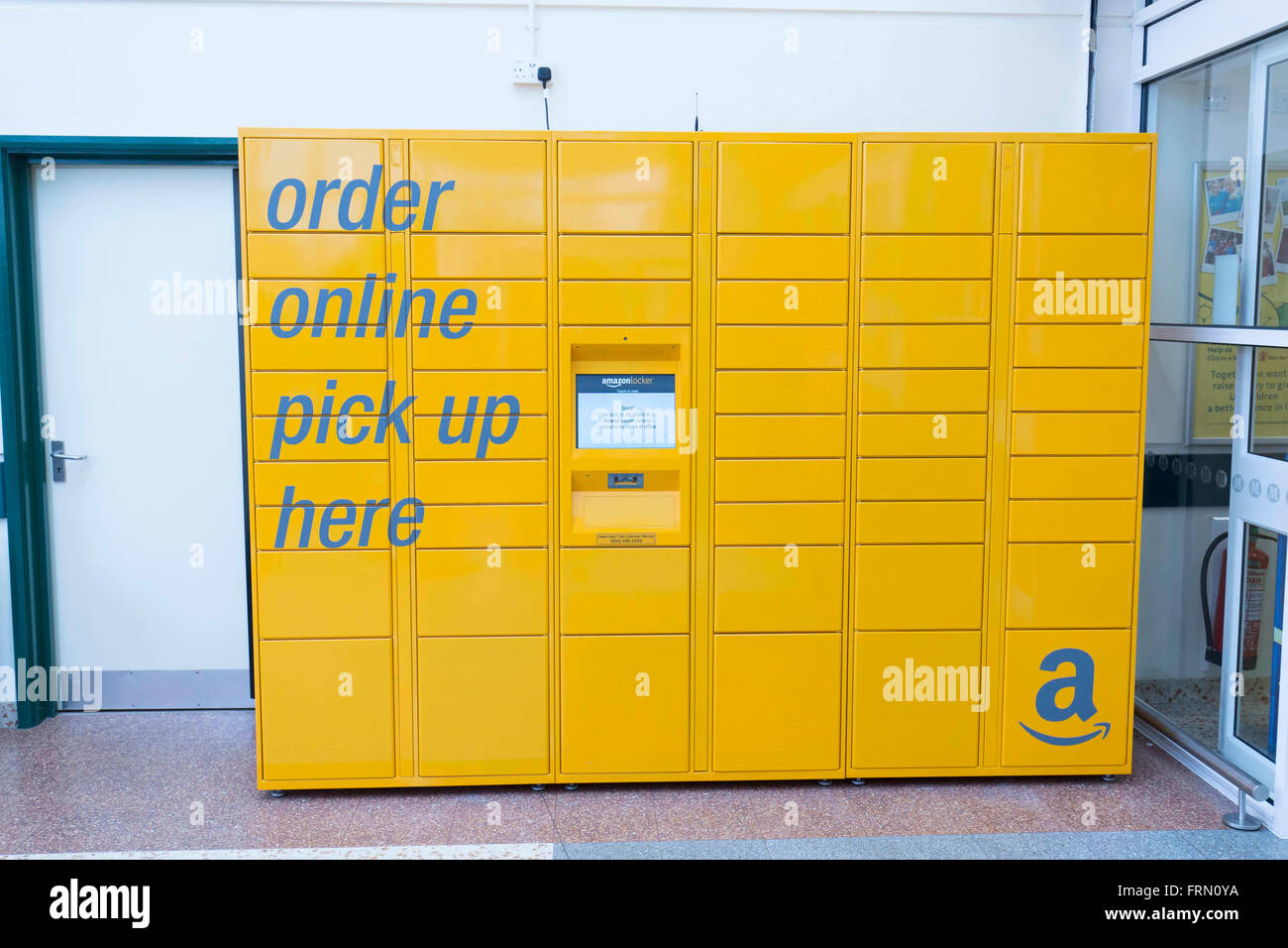 Amazon online order pick up collection point in a Morrisons supermarket Stock Photo