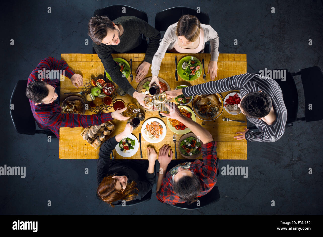 Top view of friends at table with food Stock Photo - Alamy