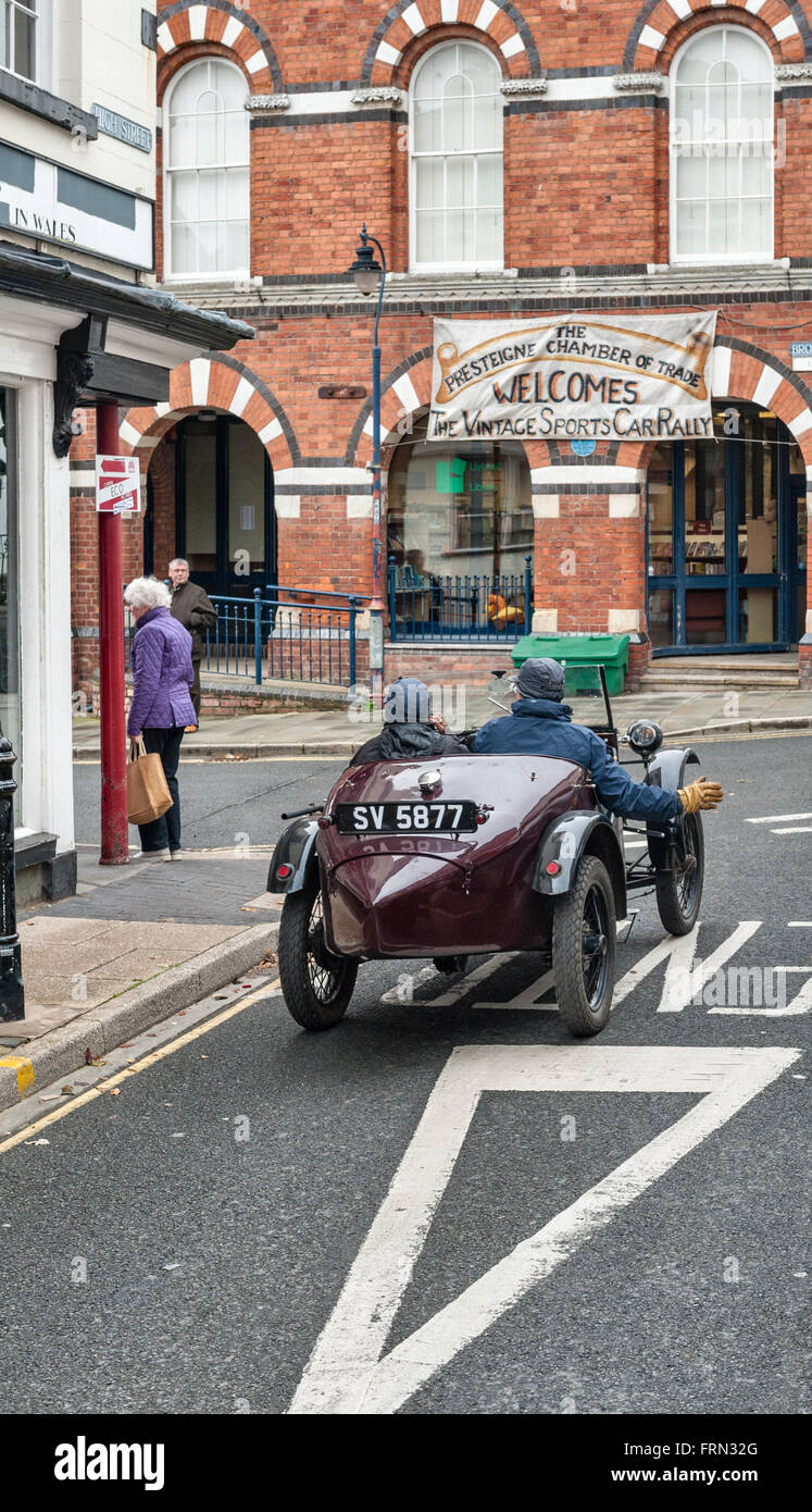 Presteigne, Powys, UK. A 1930 Austin 7 drives through this small Welsh town during the annual Vintage Sports-Car Club rally Stock Photo