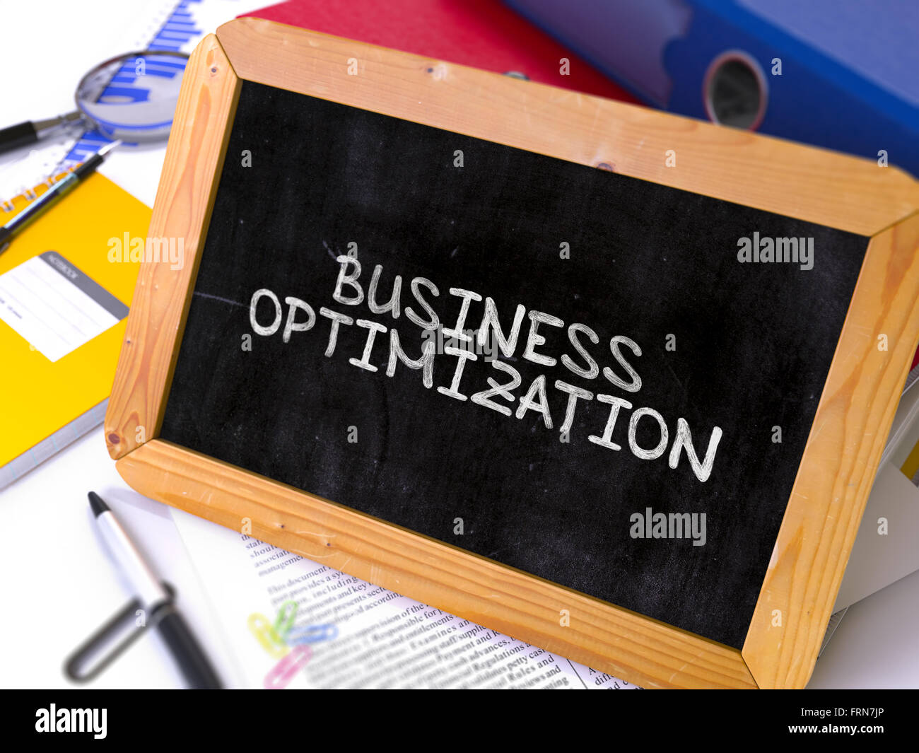 Business Optimization Handwritten on Chalkboard Stock Photo - Alamy