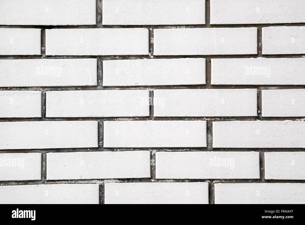 Exposed white vintage brick wall texture, brickwork pattern as background Stock Photo