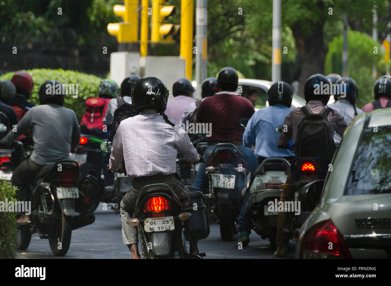 Motorcycles in traffic, Delhi, India Stock Photo